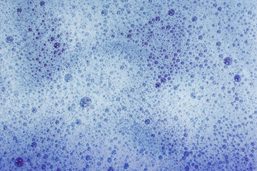 Soap bubbles background- suds liquid