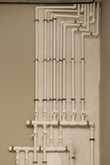 clean line white water pipes watering system pipe engineer design in underground. plastic white pipe heating manifold