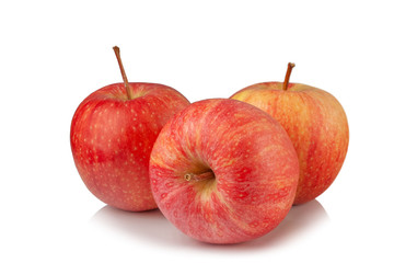 three red apples on white background