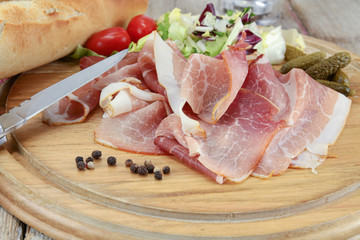 slice of dry ham on a cutting board