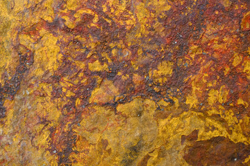 Backgraund of natural stone rust color texture a copy space.