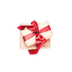 Gifts with red bow on white background.