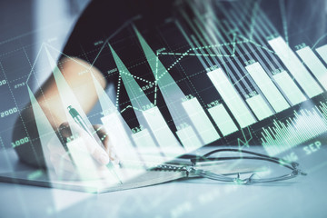 Multi exposure of woman's hands making notes with forex graph hologram. Concept of technical analysis.