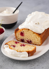 Cake with raspberries and whipped cream. Copy space.