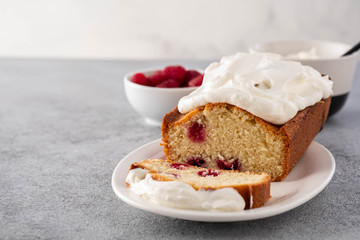Cake with raspberries and whipped cream. Copy space.