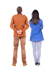 Back view of couple. beautiful friendly girl and guy together.