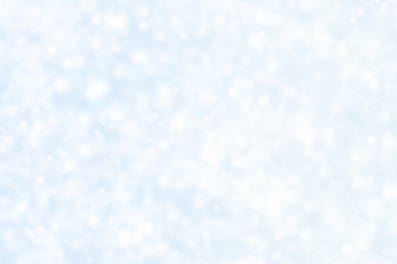 Fondo azul navideño con copos de nieve.