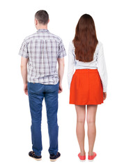 Back view of couple. beautiful friendly girl and guy together.