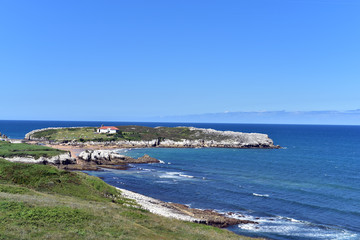 Fototapeta na wymiar Atlantic ocean rocky coastline near Santander, Cantabria, Northern Spain