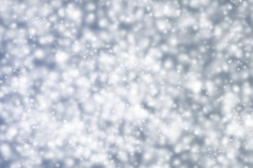 Fondo azul navideño con copos de nieve.