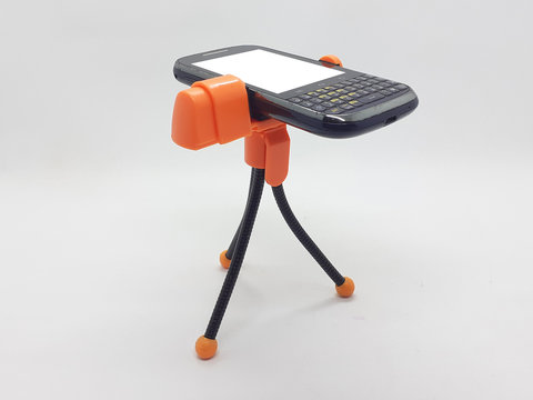 Orange Black Colorful Stable Handheld Mobile Phone Gorilla Pod Flexible Accessories for Photography and Video Recording Appliances in White Isolated Background