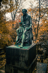 Paris, France - November 18, 2019: Graves and crypts in Pere Lachaise Cemetery, This cemetery is the final resting place for many famous people