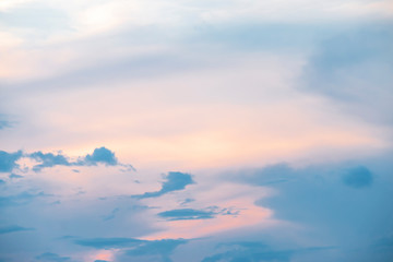 Evening light with clouds and blue sky.