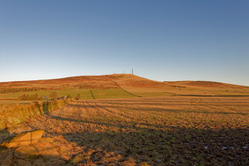 Fototapeta na wymiar Gallow Hill with its associated Communications Masts and Towers is one of the highest hill in the Sidlaws of Angus, overlooking Dundee.