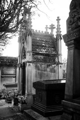 Paris, France - November 18, 2019: Graves and crypts in Pere Lachaise Cemetery, This cemetery is the final resting place for many famous people