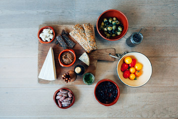 high angle view of tapas food disposed on a wooden table