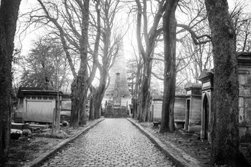 Paris, France - November 18, 2019: Graves and crypts in Pere Lachaise Cemetery, This cemetery is the final resting place for many famous people