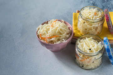  fermented sauerkraut village vegan salad in a glass jar. healthy product. rustic food. Probiotics concept.