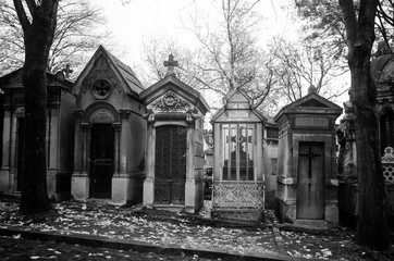 Paris, France - November 18, 2019: Graves and crypts in Pere Lachaise Cemetery, This cemetery is the final resting place for many famous people