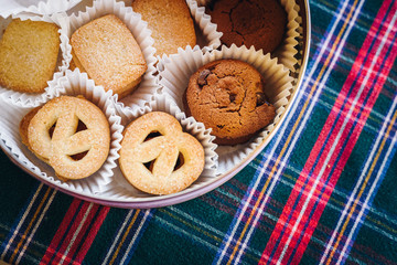 Variety of biscuits in a box.  Christmas cookies