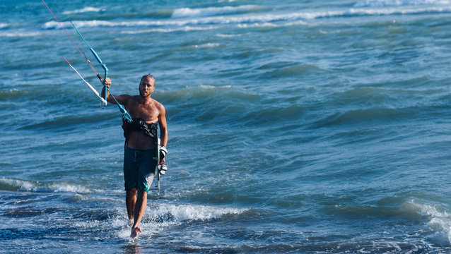 Kitesurfer Holding Control Bar