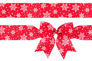 Red burlap ribbon bow with snowflakes isolated on white background