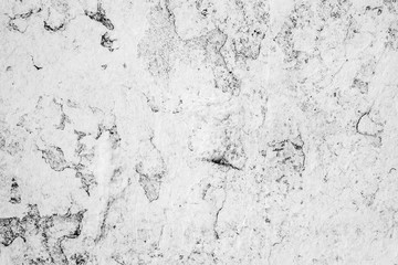 Texture of a concrete wall with cracks and scratches which can be used as a background