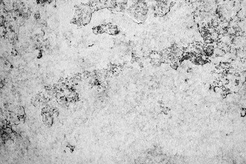 Fototapeta premium Texture of a concrete wall with cracks and scratches which can be used as a background