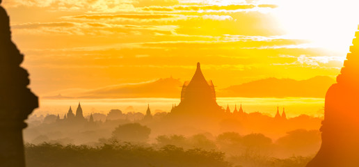 Bagan City Burma Beautiful Sunrise over the  Dhammayazika Pagoda and Brick Pagodas