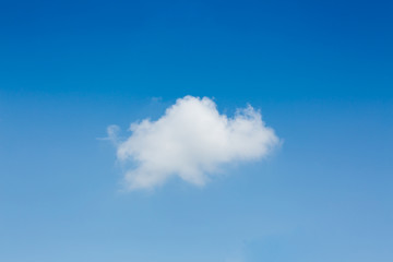 single cloud on clear blue sky