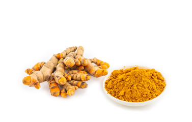 fresh turmeric root and turmeric powder in spoon on white background