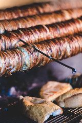 Turkish traditional food Kokorec roasting on the fire