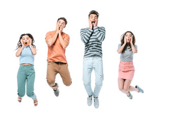 Fototapeta premium excited friends screaming and jumping, isolated on white