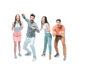 Fototapeta premium excited friends screaming and showing thumbs up isolated on white