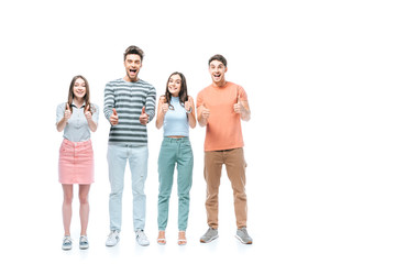 Obraz premium excited friends yelling and showing thumbs up isolated on white