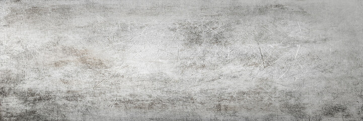 Scratched grunge texture with old,dusty and dirty surface.Vintage retro background.Long panoramic horizontal format. 