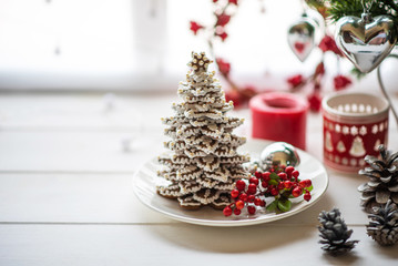 Christmas cookies with festive decoration. Homemade gingerbread. Winter decoration background.