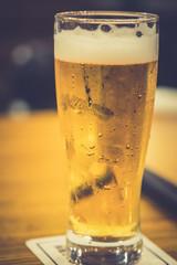 Chilled glass of light beer