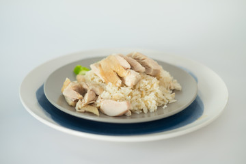 Rice steamed with chicken soup (hainanese chicken rice)