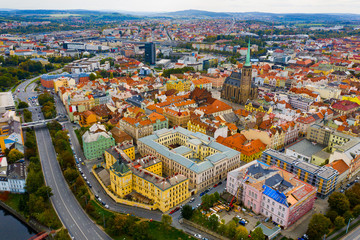 Picturesque aerial view of old buildings of Pilsen cityscape with river and ponds, Czech Republic