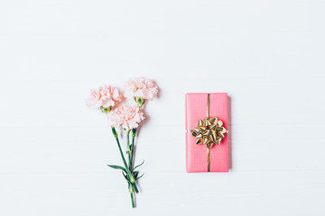 Top view of bouquet and gift box