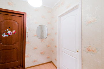 Russia, Moscow- August 01, 2019: interior room apartment. standard repair decoration in hostel. room doors, repair corridor