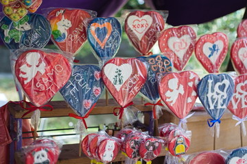 colorful heart shaped lollipops on display