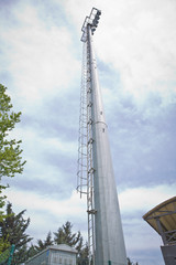 Obraz premium Pillar spotlights Sky blue . electricity industry, Light stadium or Sports lighting . 