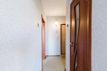Russia, Moscow- August 01, 2019: interior room apartment. standard repair decoration in hostel. room doors, repair corridor