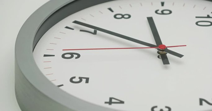 Truck shot of time-lapse gray clock with black arrows shows motion the time speed up from 8.00 a.m. to 9 a.m., How time flies concept.