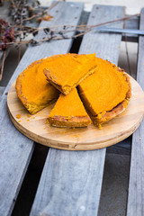 Pumpkin yellow tart, casserole or pie. Homemade vegan or vegetarian dessert.