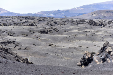 Black lava in the volcanic Timanfaya National Park, Lanzarote, Canary Islands, Spain