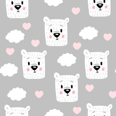 Seamless baby print with cute polar bears heads on gray background.