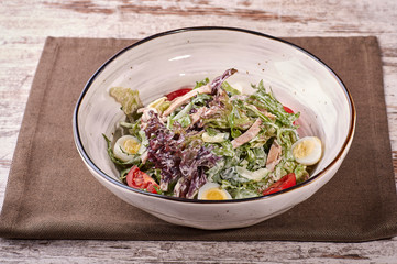 restaurant dish on white and gray plates, on a table